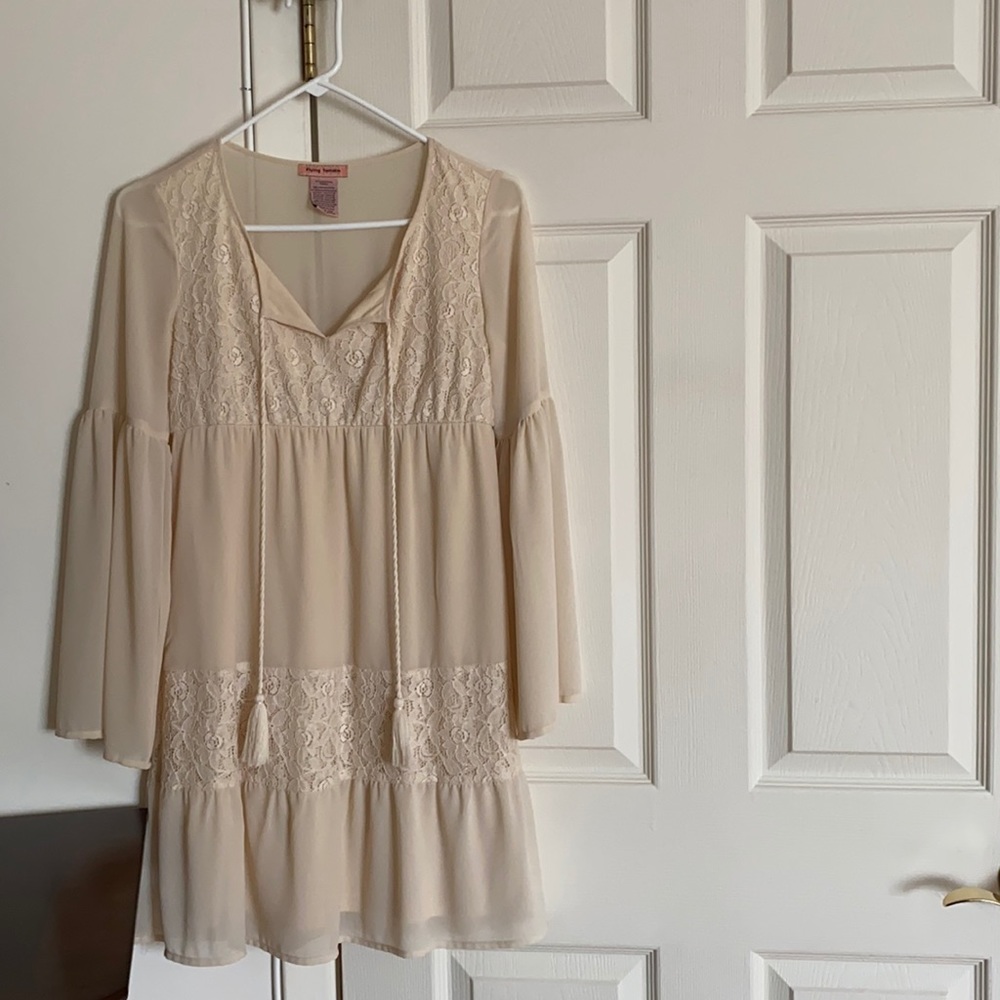 “Greek Goddess” knee-length dress.